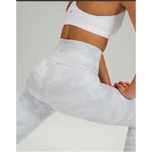 Lululemon white camo leggings! Size tag taken out, but they are a size 12!